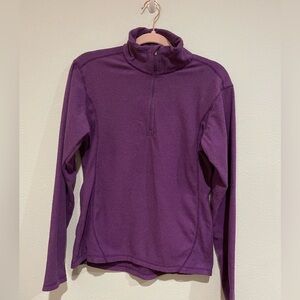 Women’s alpine design quarter zip pullover in purple. Size M